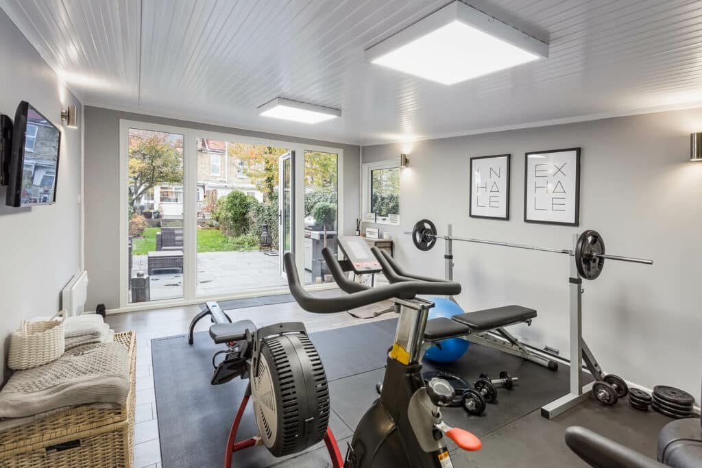 interior of a garden home gym with the doors open