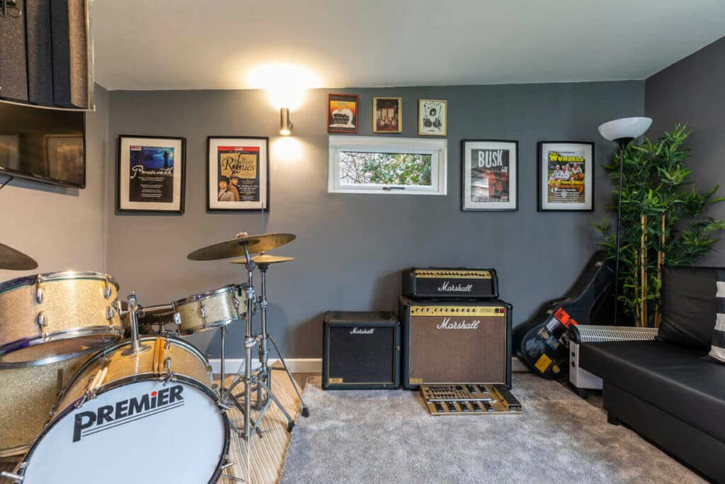 teen den games room thats been turned into a music room