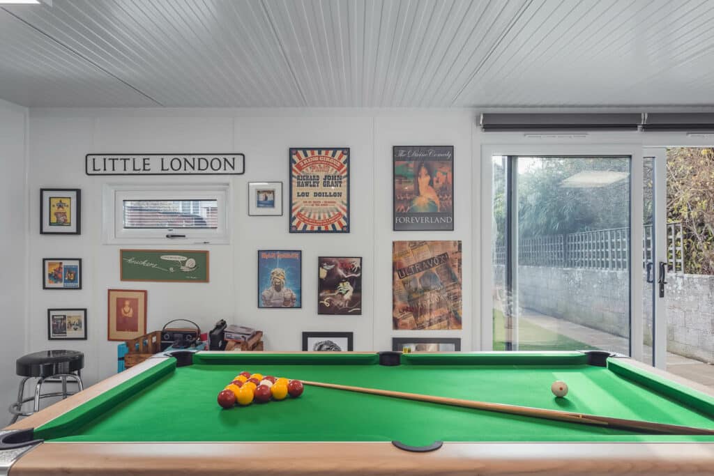 pool balls and cue on table