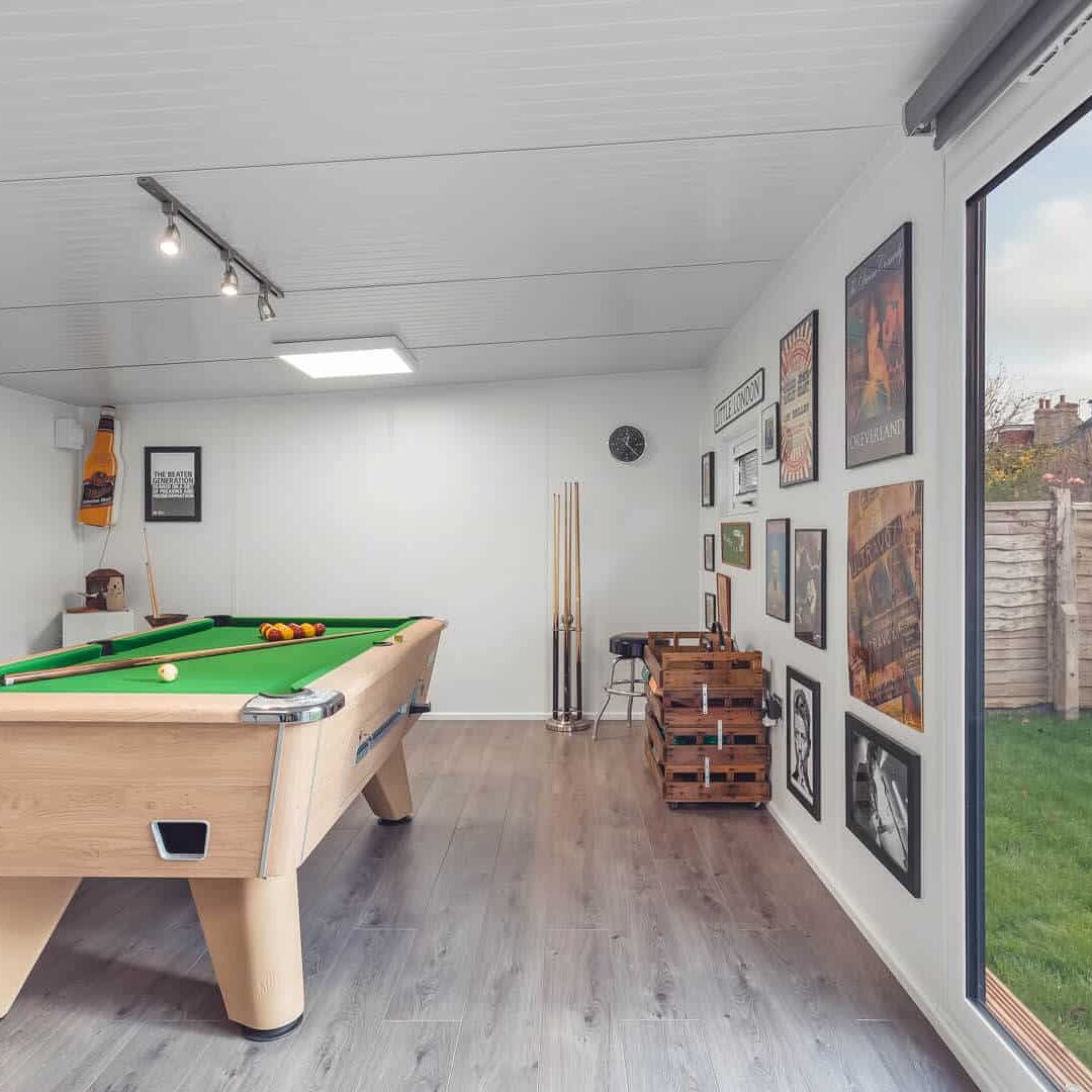 Pool table with storage and pool cues
