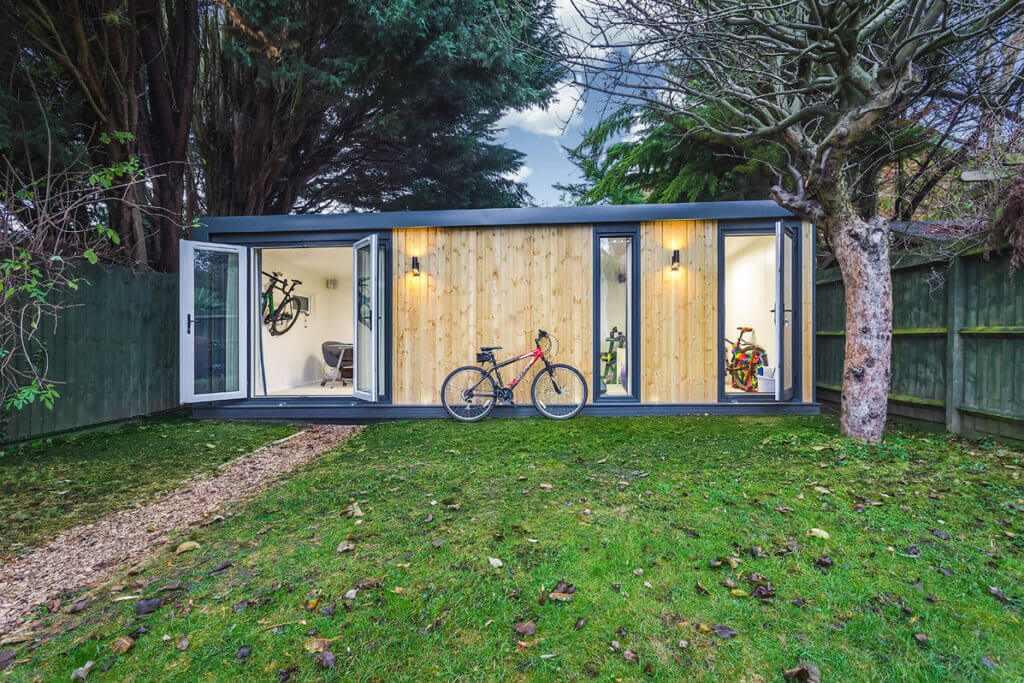 Large wooden garden room with seperate bike store area