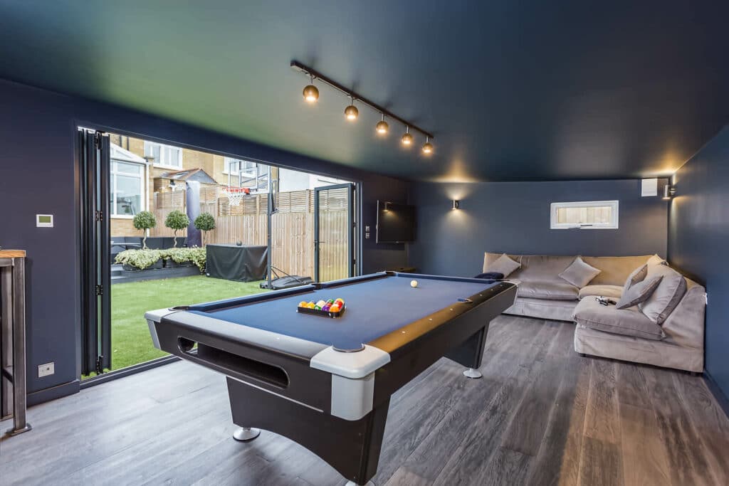 games room with pool table and dark blue theme