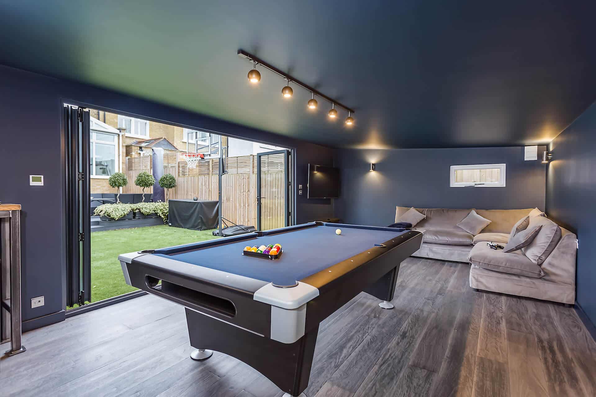 interior of garden games room with a pool table