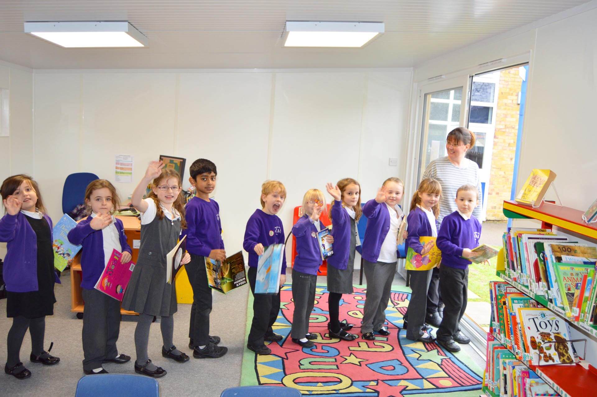 Children queueing up to leave their school library