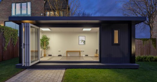 composite black garden building with bi folding doors