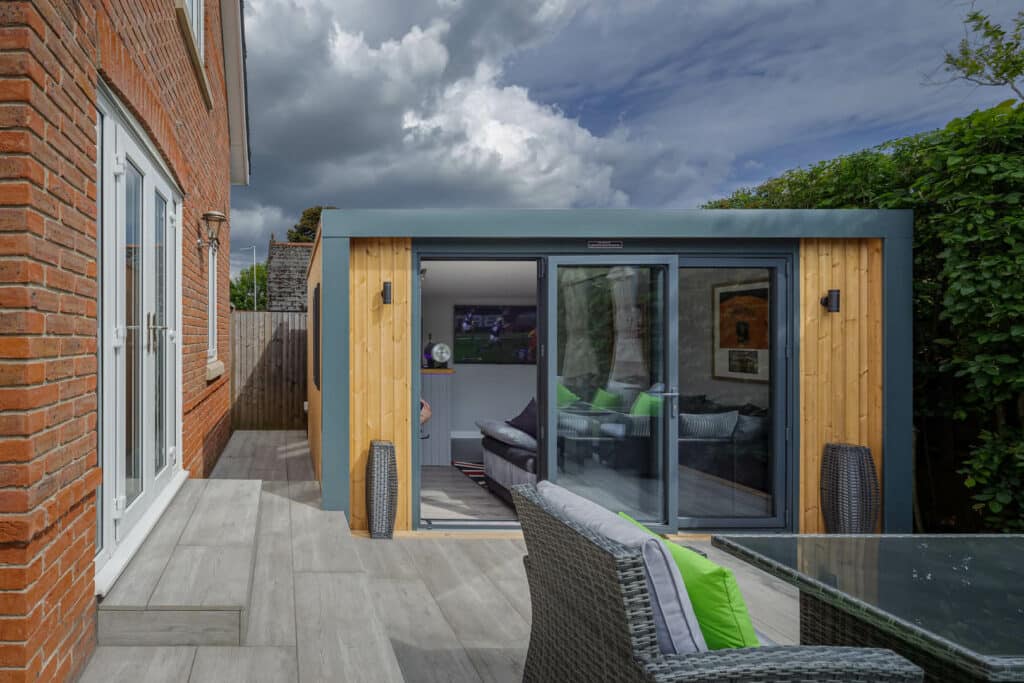 Exterior photo of Inspiration with bi-folds slightly open and garden furniture in front of the building