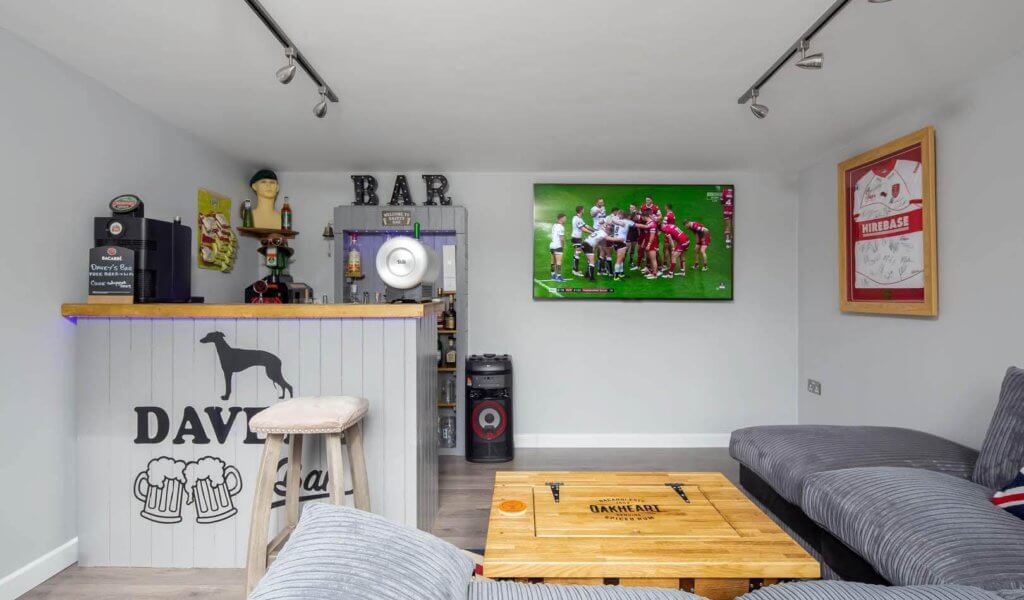 garden pub interior with bar and tv