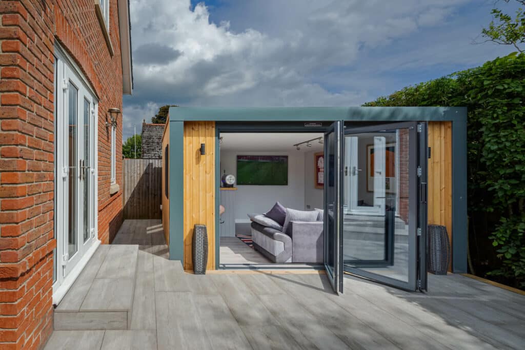 Exterior of Inspiration with bi-folds half open looking into man cave