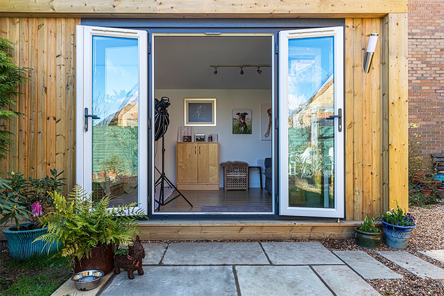 Exterior shot of a garden room being used as a photography studio