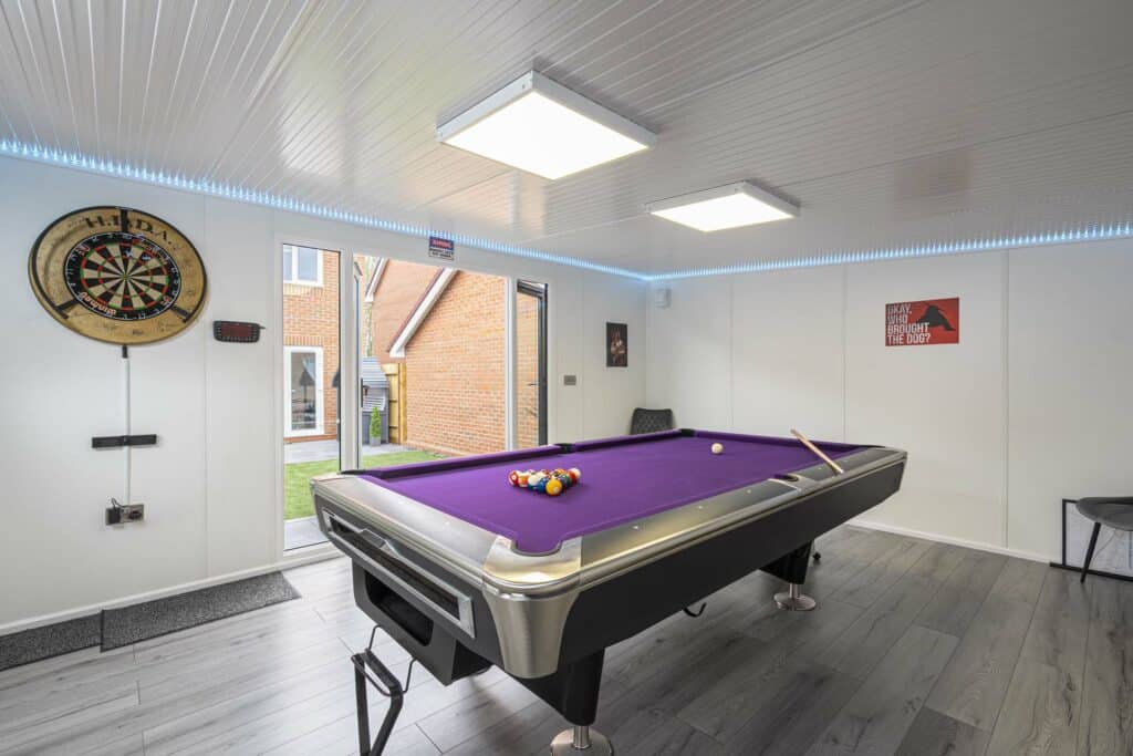 Games room space with composite grey flooring