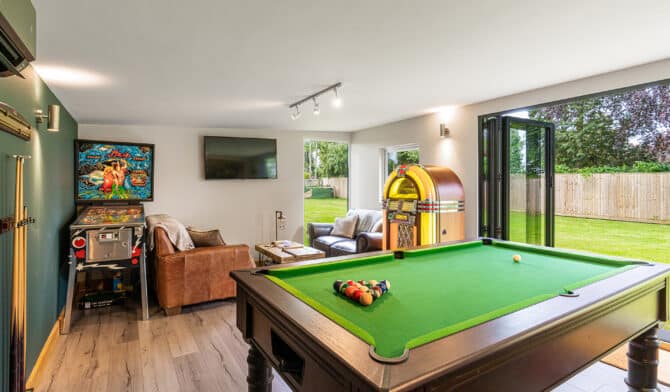 close up pool table in a garden games room and man cave ideas