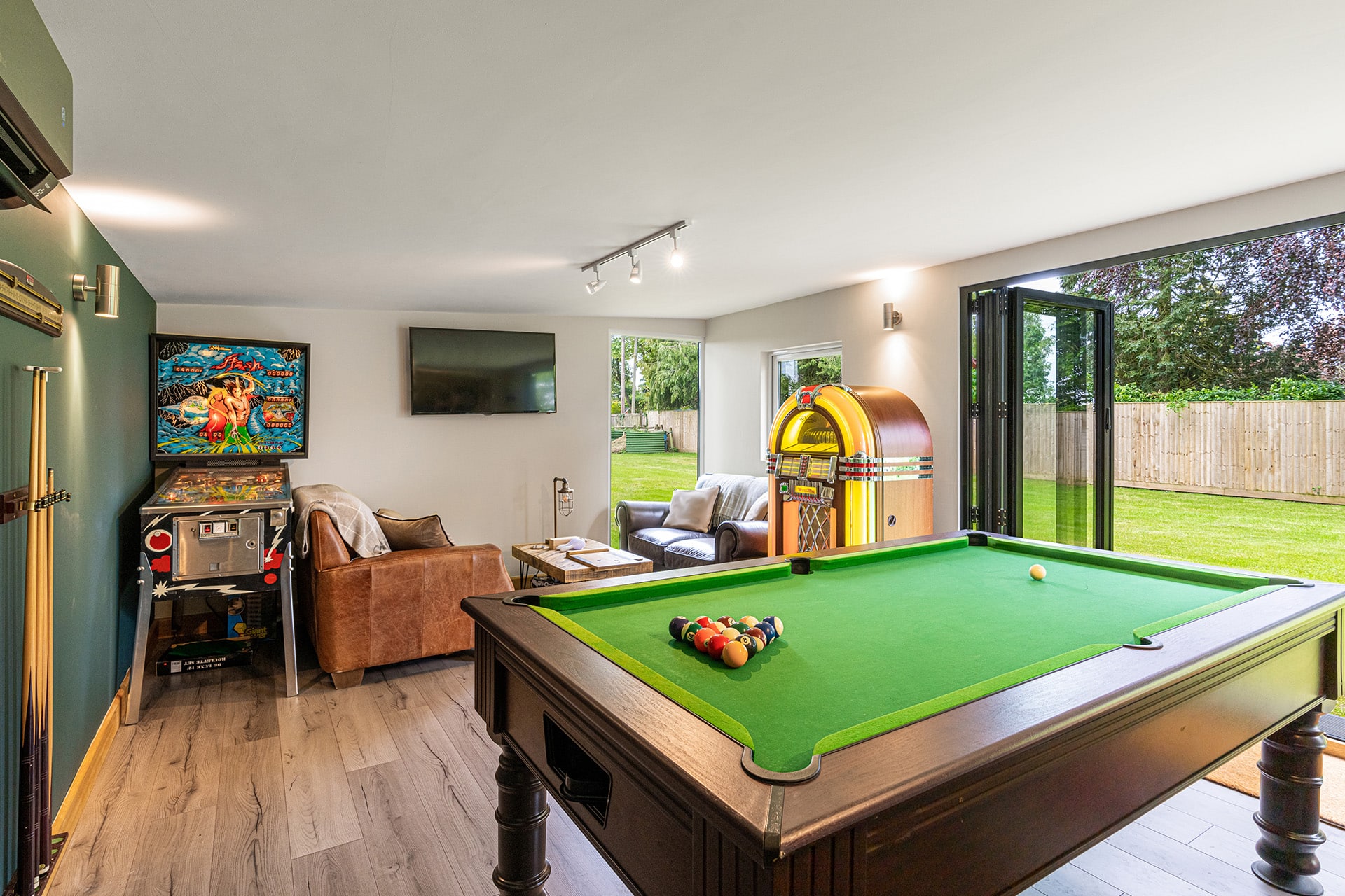 close up pool table in a garden games room and man cave ideas