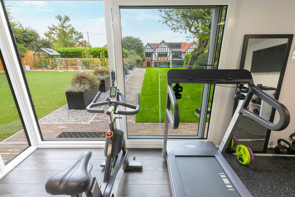 garden gym with exercise bike and treadmill
