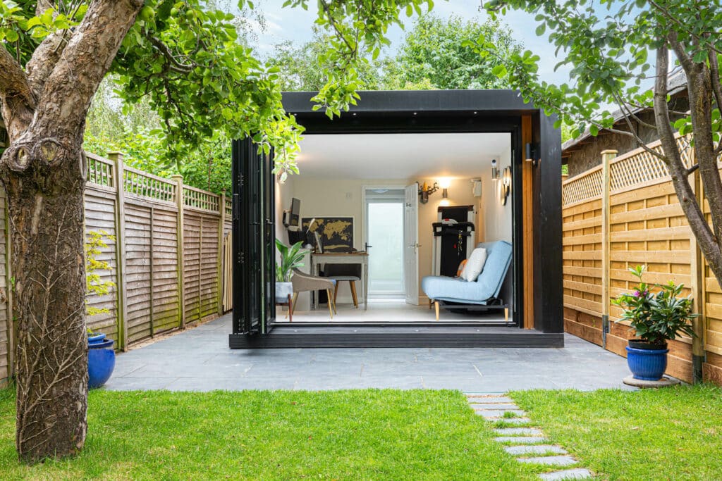 Relaxing garden office pod with open doors & single door at the back