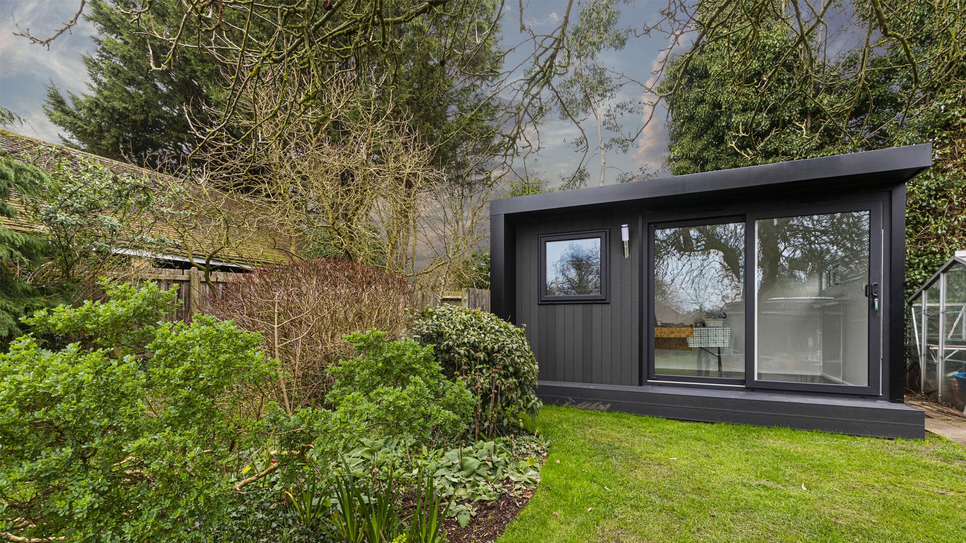composite garden room with bi-fold doors used as an office