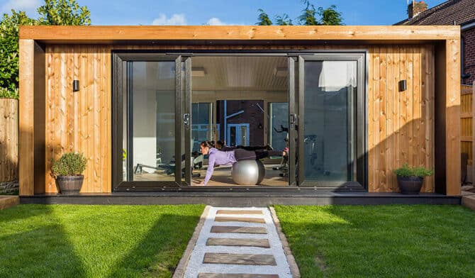 woman on exercise ball in outdoor home gym