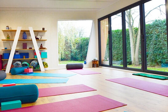 green retreats home gym transformed into a spacious yoga studio